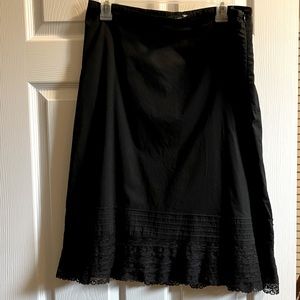 H&M Women’s size 12 black with lace trim skirt.